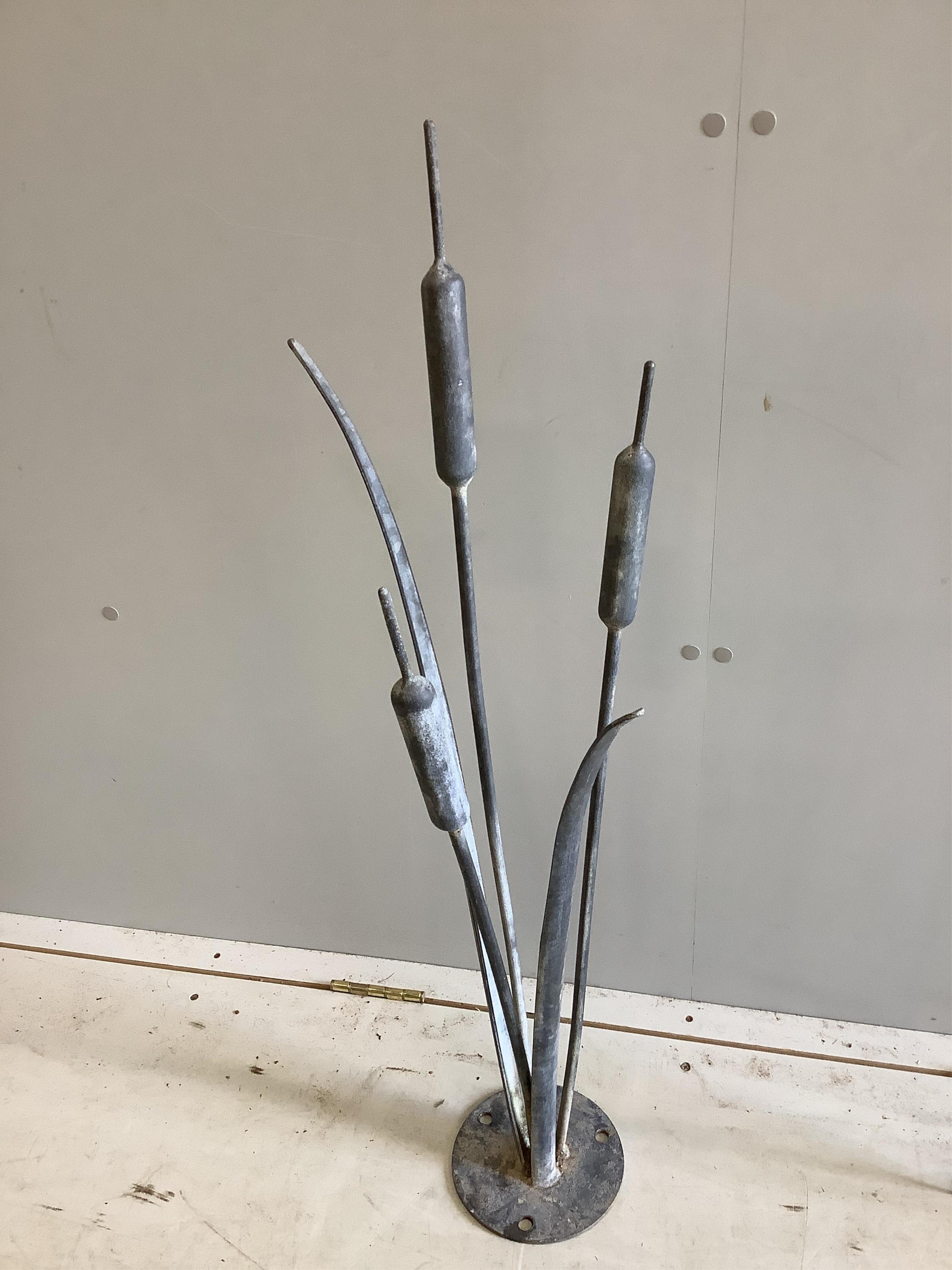 Two Ian Gill forged steel bulrush and reed garden sculptures, (one a bird feeder stand), larger height 200cm. Condition - good